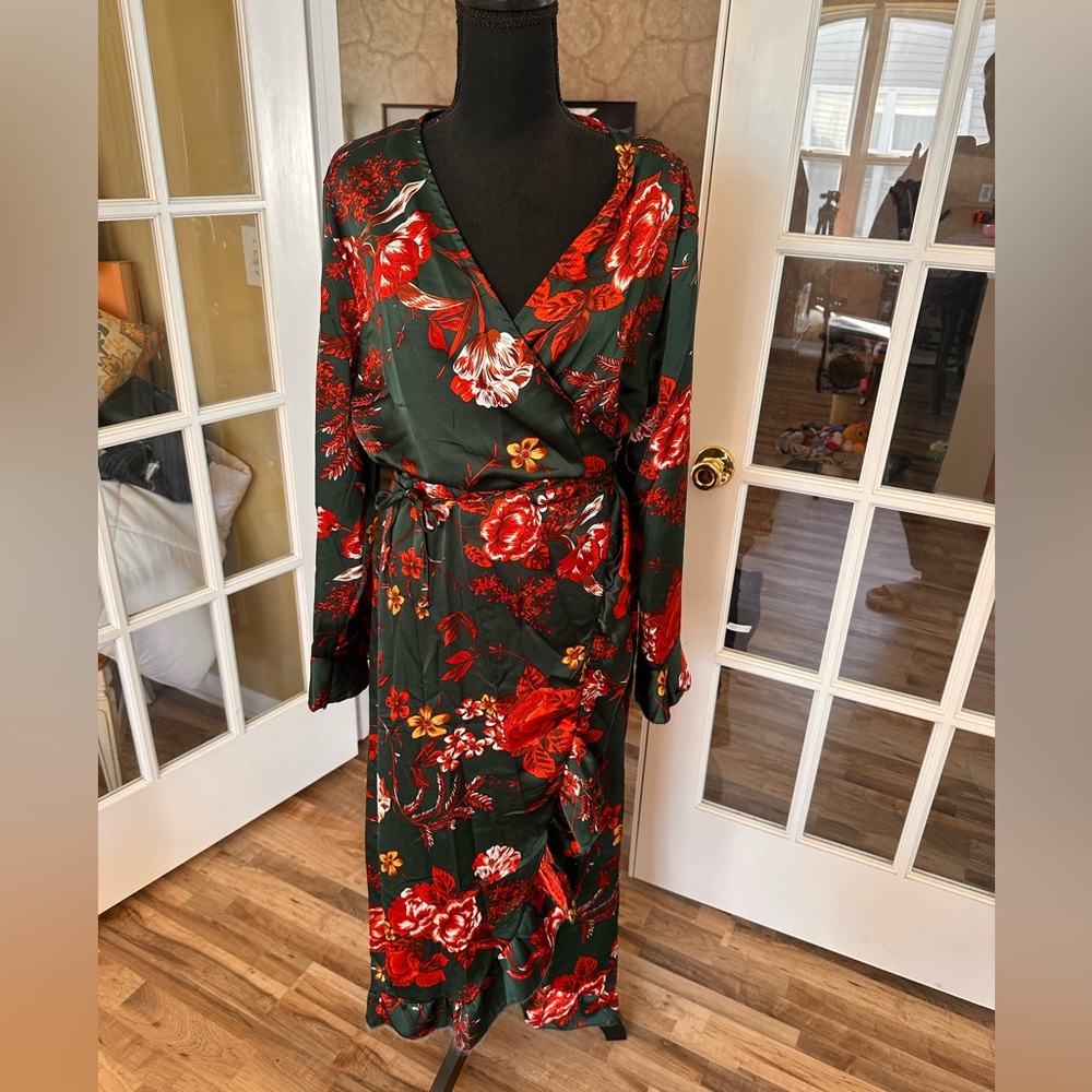 Never worn. Wrap dress. Print for a flattering look.